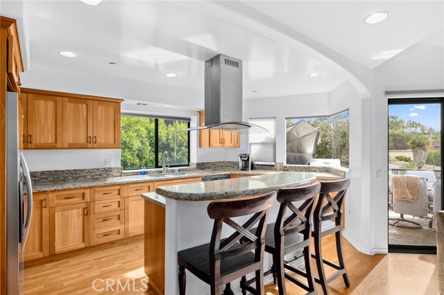 336 Y - Kitchen feature breakfast bar, abundant wood cabinetry and premium stainless steel appliances.
