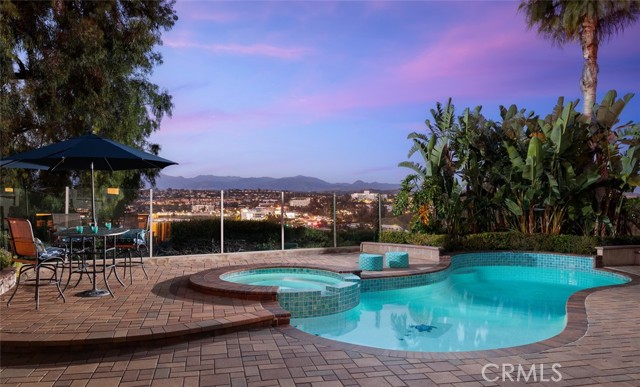 Enjoy City Light and Mountain Views from the Swimming Pool, Spa and Patios