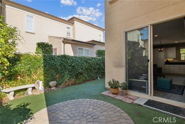 Backyard Patio with pavers and artificial grass