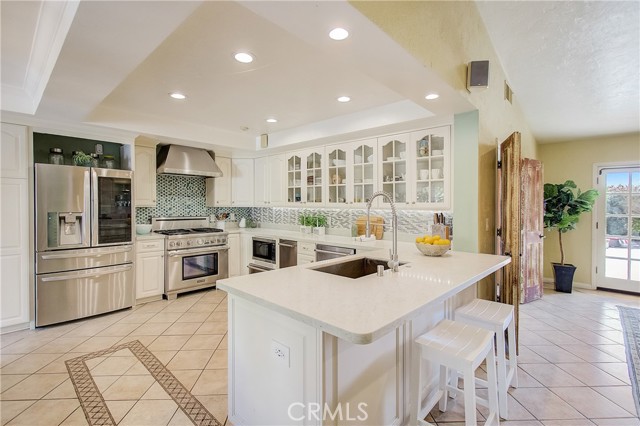 GORGEOUS Country Estate kitchen with in kitchen dining....Opens up to the family room.