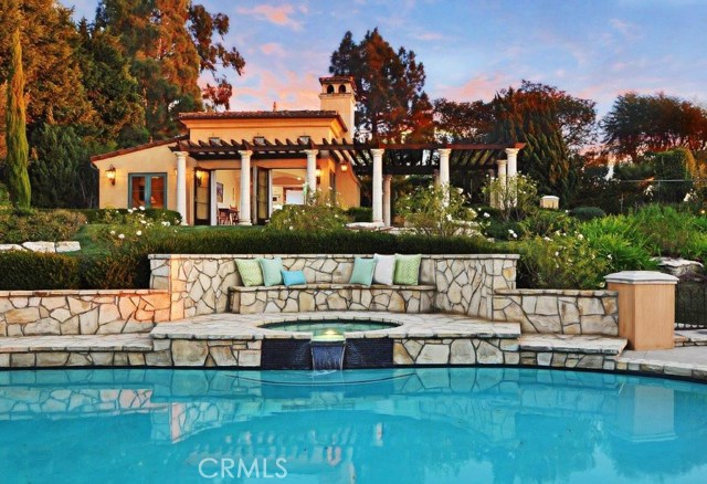 View of the pool and full guest house from the veranda