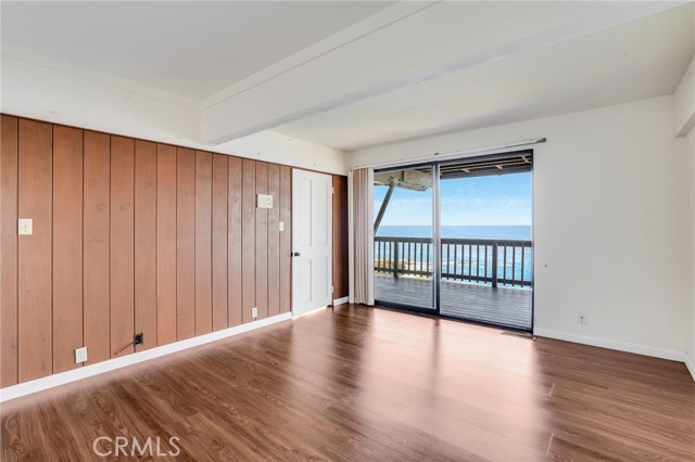 Lower Level Bedroom #3  with panoramic ocean view deck attached.