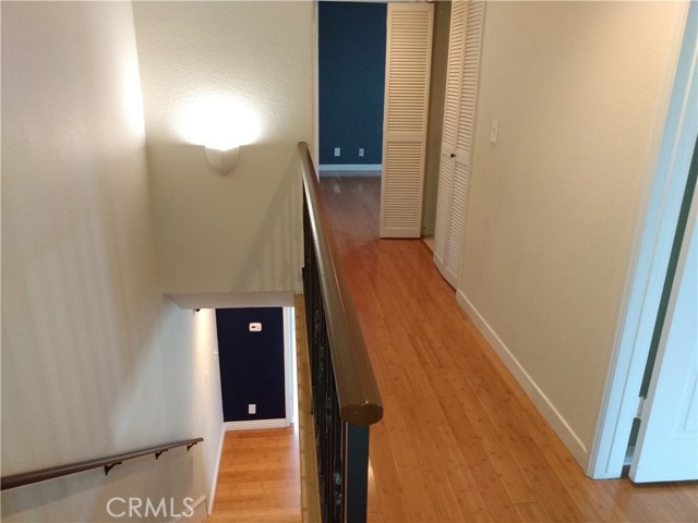 Upstairs Hallway with extremely convenient nearby Laundry to both B/R's, also with a nearby newer FAU furnace & newer hot water heater directly across.