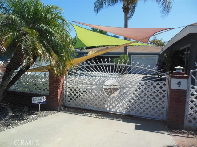 gated entrance to garage, driveway.