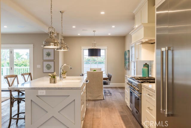 Lots of dining options--breakfast bar, dining table or take your coffee to the deck.