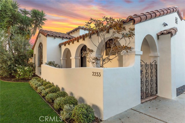 2233 21st Street Santa Monica, California A blend of beauty, comfort and elegance, this enchanting single-story Spanish delivers a modern rendition of a timeless and classic design. Sitting on a tree-lined street in the highly desirable Sunset Park neighborhood of Santa Monica, this completely-renovated residence offers privacy and serenity, due to its gated courtyard entry, fenced & hedged garden, and pergola-covered outdoor dining lounge. The kitchen -- with its custom built-in cabinetry, Caesarstone quartz countertops, and top-of-the line Viking appliances -- overlooks a windowed, open dining area. The front-facing living room is off the entry and boasts a barrel ceiling, French Oak flooring, and an arched wood-paned window. The spacious master suite contains a walk-in closet, and a breathtaking bathroom, with its Carrera marble countertops, Mirabelle freestanding tub, honed granite shower and encaustic tile flooring. The permitted guest casita opens onto the garden through french doors and includes a wet bar, guest bathroom and an abundance of storage. The property offers the height of luxury and relaxation with updated systems, state-of-the art technology, perimeter lighting and a Control4 Smart Home OS. Central, westside location -- just minutes from the beach -- situated between Ocean Park and Pico, with easy access to all of the amenities that Santa Monica has to offer including award-winning schools, parks, recreation, farmer’s markets, shopping, dining and entertainment. Live your best life in Santa Monica.