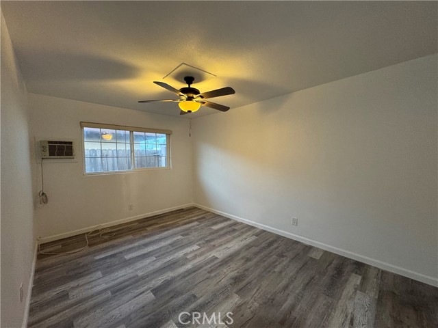 Bedrooms have ceiling fans and wall AC units.