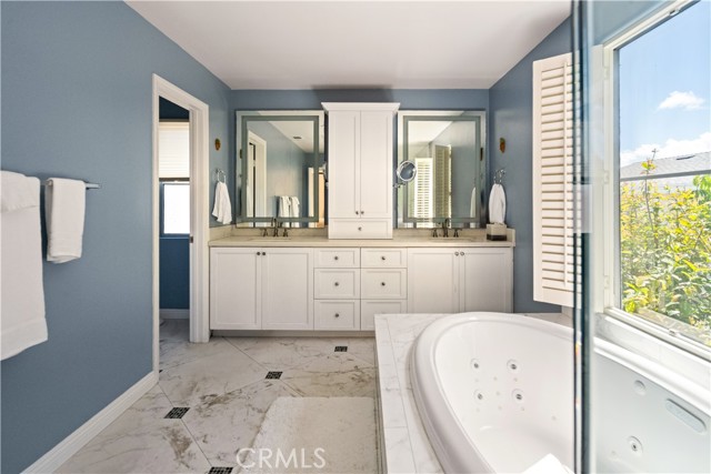 Primary bathroom, separate shower and tub.