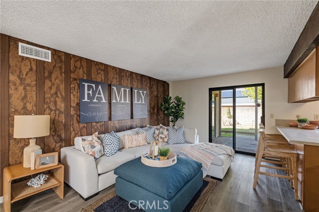 Family Room with sliding glass doors leading to the large backyard