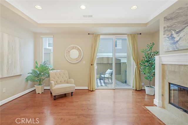 Family room with fireplace and private patio