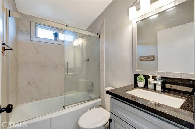 Bathroom 2 with quartz counters and modern finishes