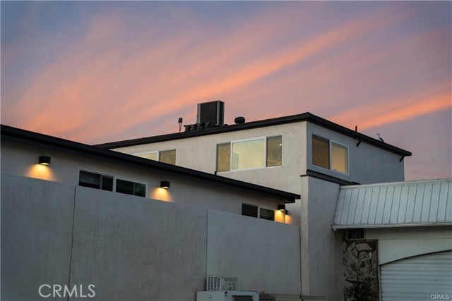 The 2 bedroom is the back unit, stand alone above garage