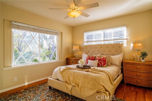 Master bedroom with charming touches and a view of the canyon.