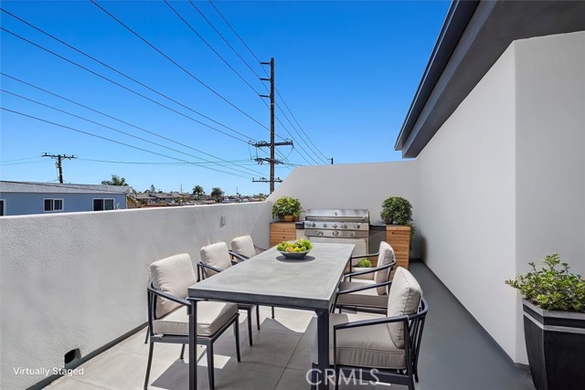 rooftop deck off of mezzanine/loft level virtually staged
