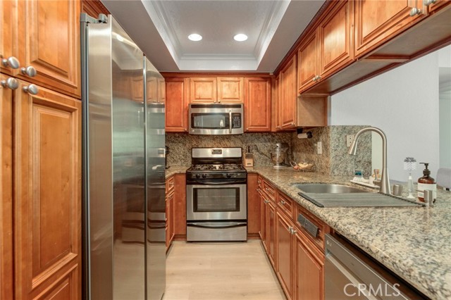 Beautiful kitchen with a brand new fridge and dishwasher