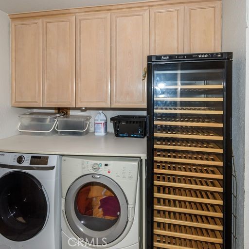 laundry room. view from inside laundry room stand at the cabinets.