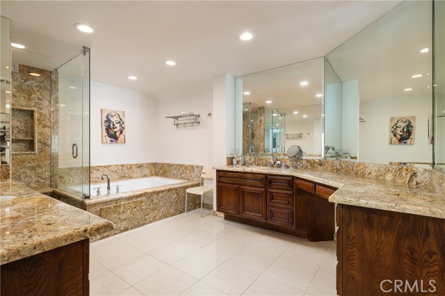 Primary bath with adjacent large walk-in closet.