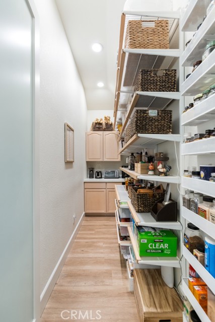 This huge walk-in pantry will hold all your canned goods, food, spices, etc. The cabinets make for the perfect place to store all those oversized appliance you don't use everyday.