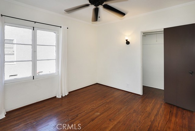 Bedroom #1 is away from the other two bedrooms and has a surprisingly large closet. It is located to the left of the living room. it would make a great office space if not a bedroom.