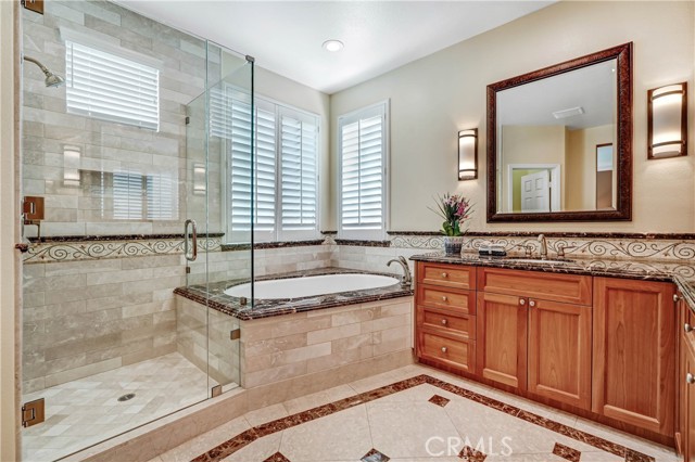 separate shower enclosure in master Bathroom, soak in tub