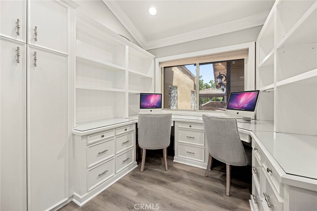 Double computer work station with built-in desks,shelves, & storage
