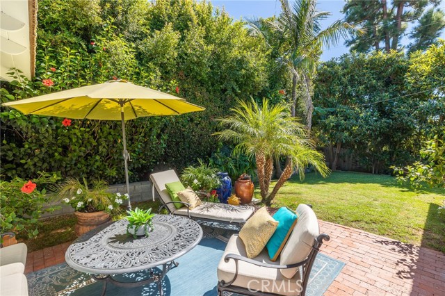 Ahhh, the patio!  Bubbling fountain and firepit set the stage for a great time in the back yard.