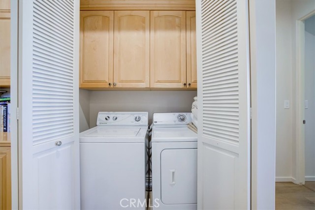 Laundry closet conveniently situated upstairs between the primary and other 2 bedrooms.