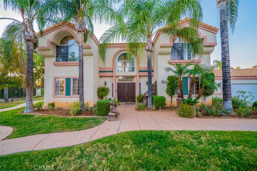 16263 Regency Ranch Road Riverside, California Beautiful Mediterranean Style Estate in Regency Ranch has Low Tax & NO HOA, Features a Grand Open entryway, with a beautiful stairway, private dining area, 5 bedrooms, 4 - 1/2 baths. One bedroom downstairs would be great for the live-in maid or mother-in-law's quarters. Primary suite with fireplace and large private area, Primary grand bath. 2 A/C Units, Oversized Entertainers backyard, the level lot allows room for a pool, tennis court, and basketball court.