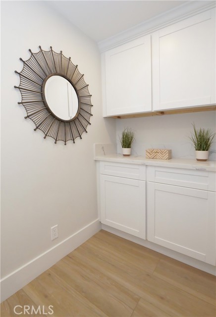 hallway linen cabinets with quartz counter top