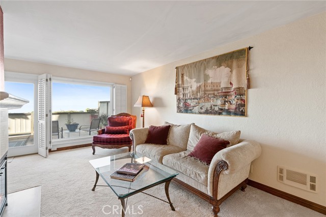 Large windows offer lots of natural light and ocean views.