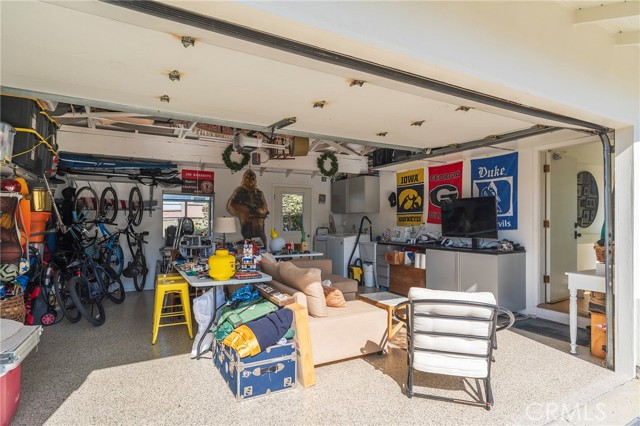 Bonus room attached 2 car garage being used as a family room