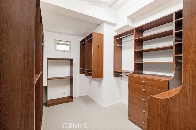 Walk in closet in Primary Suite bedroom