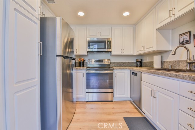 Updated kitchen, stainless appliances, Granite Transformations counter tops