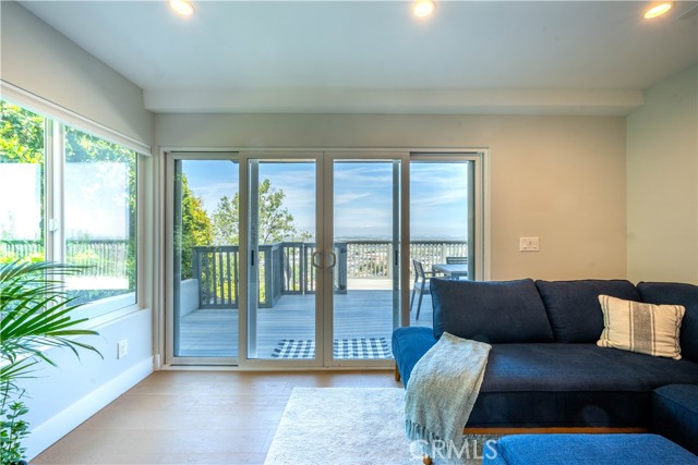 View from family room out to large lower level deck