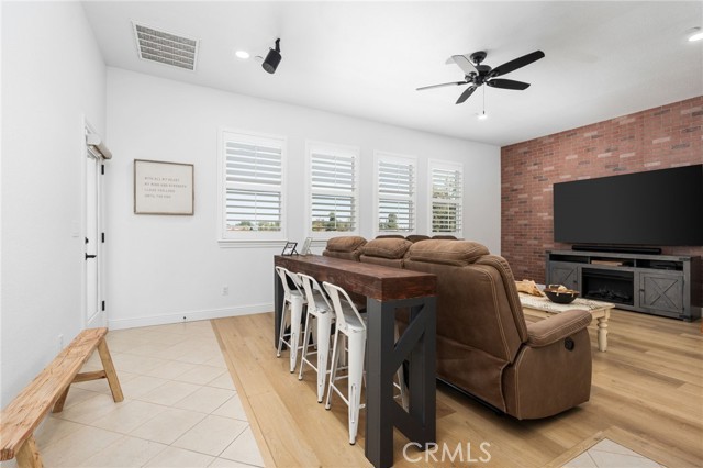 Bedroom 4 currently used as a media room has walk in closet, and a door to the outside ! Lots of  possibilities if a 4th bedroom not needed
