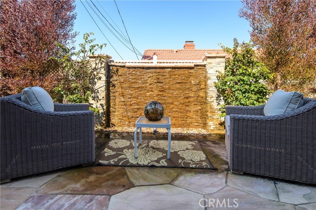 Sparkling water feature in the rear patio off the dining room for tranquility!