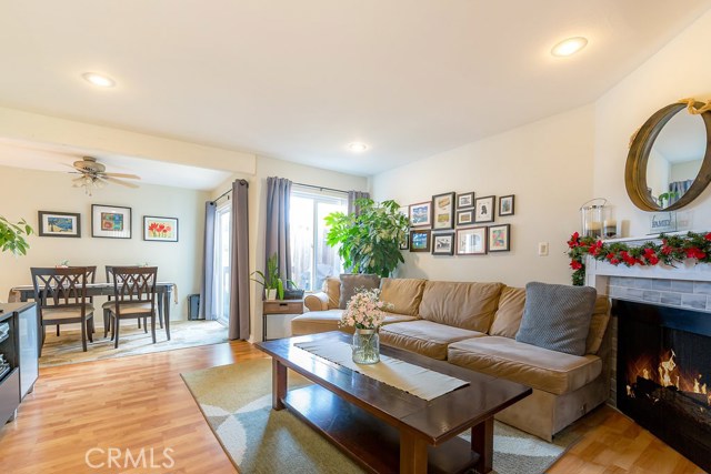 Enjoy beautiful laminate wood floors, recessed lighting and dual-paned windows