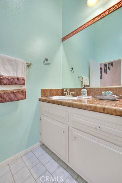 Powder Room Off Stairway.  Full Width Mirror Not Offered In Newer Homes