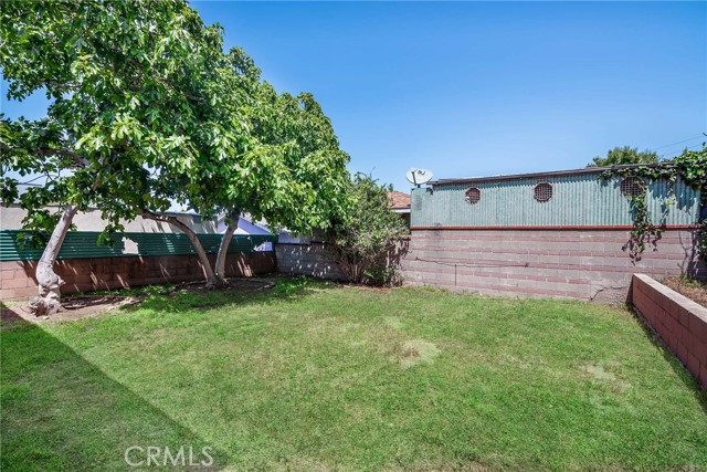 Not too many homes this close to the beach have oversized grassy private rear  yards!