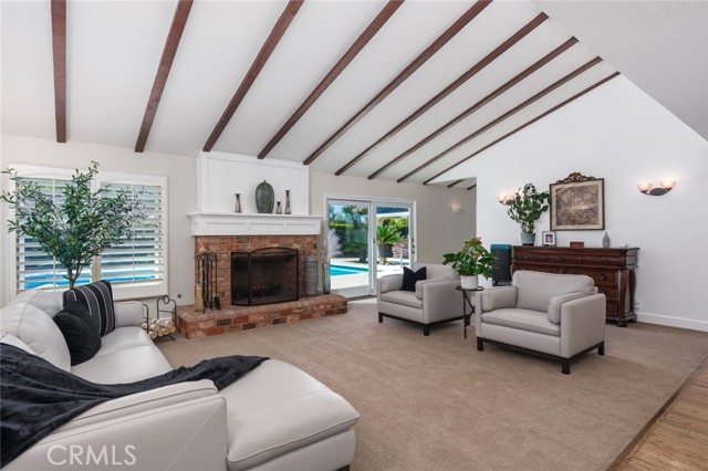 Living room has cozy fireplace