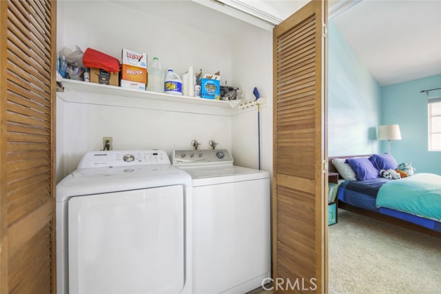 Laundry located on upper level near bedrooms.