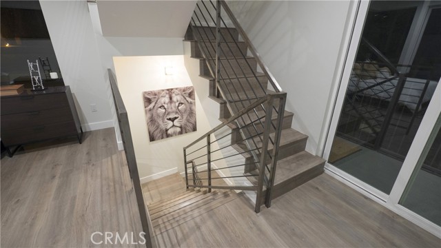 From kitchen dining through 2nd floor living room (and sleeping) to stairs up to master bedroom