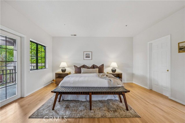 Main level primary bedroom from entry