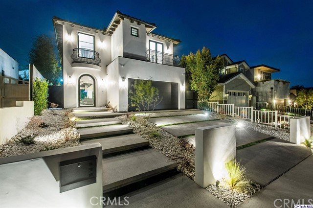 946 Embury Street Pacific Palisades, California Sleek and elegant new construction in Pacific Palisades, designed and built by Arzuman Brothers. This uniquely designed Spanish Contemporary home features the perfect blend of inside/outside flow and open space design. Prepare your best dishes in the gourmet kitchen that includes a spacious large island, custom made cabinetry, state of the art appliances, and an attached breakfast table. A few of the many features in the private backyard include a spa, patio, and outdoor seating area with fireplace. Green trees and bushes surrounding the backyard create the ultimate privacy and the perfect place to entertain. Inside you will find 5 en-suite bedrooms along with a spacious landing on the second floor. Once you retreat to the master suite, you are invited once again with open space and a perfect harmony of bedroom, bathroom, and walk-in closet. Full smart home that controls music, lights, air conditioning, cameras, security system, and much more. Electric car charger and solar hook ups ready. One block away from Palisades Village and close to shops and restaurants on Sunset Blvd.