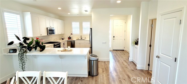 Plank vinyl flooring through-out. Upgraded tile in bathrooms.