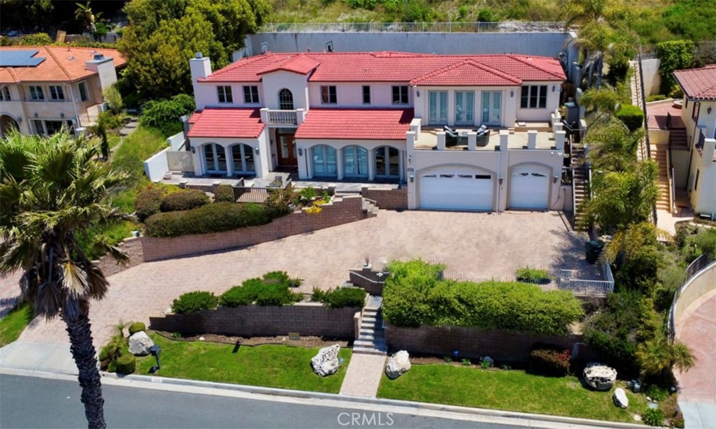 This custom-built home was originally built in 2006 in a desirable Monaco neighborhood. It is an excellent opportunity to enjoy the amazing expansive views of the Pacific Ocean and Catalina Island from the family room, living room, kitchen, and bedrooms upstairs. Grand entry, high ceilings throughout. The gourmet kitchen/family room overlooks the ocean views making it a perfect place for hosting great dinner parties or intimate family gatherings. The upstairs master suite is a real sanctuary with breathtaking Ocean views and features dual walk-in closets, an en-suite bathroom with a jacuzzi tub, a shower, and a wood-lined sauna. The private balcony will treat you to a jaw-dropping panoramic ocean view and breathtaking sunsets by the Pacific Ocean. Three-car garage with high ceilings.  Laundry room with utility sink, and cabinets for storage. The back patio is piped for the future endless lap pool. This property offers privacy and a peaceful living environment while still being close to shopping centers, parks, golf courses, Terranea Resort, and other amenities of the surrounding area. Monaco HOA fee is $150 annually. Don't miss out on this opportunity to enjoy the amazing property with the breathtaking views of the Pacific Ocean and Catalina islands. Move-in-ready. Motivated Sellers.Also available for lease at $10995 per month. Call the listing agent for details.