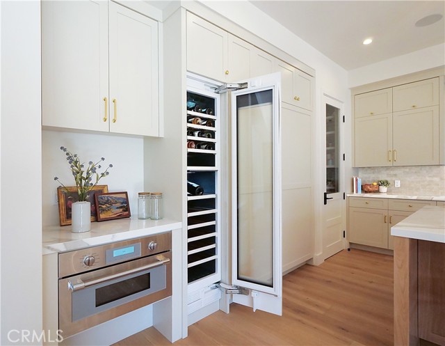 Speed Oven, Wine Cooler, Refrigerator & Walk-in pantry