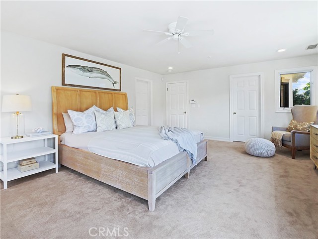 master bedroom with fireplace & 2 walk in closets