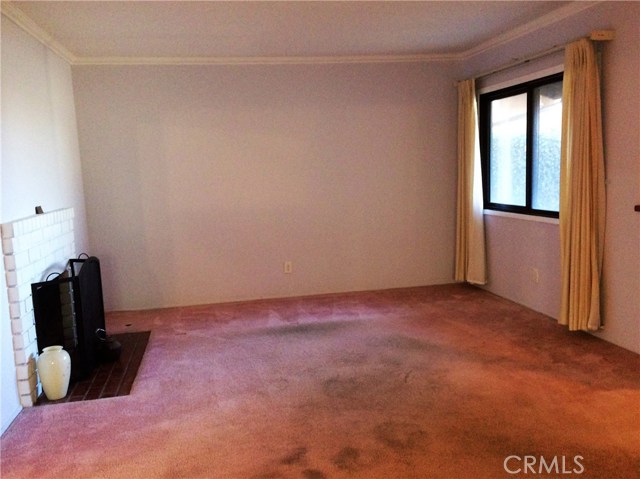 Living room with gas fireplace.