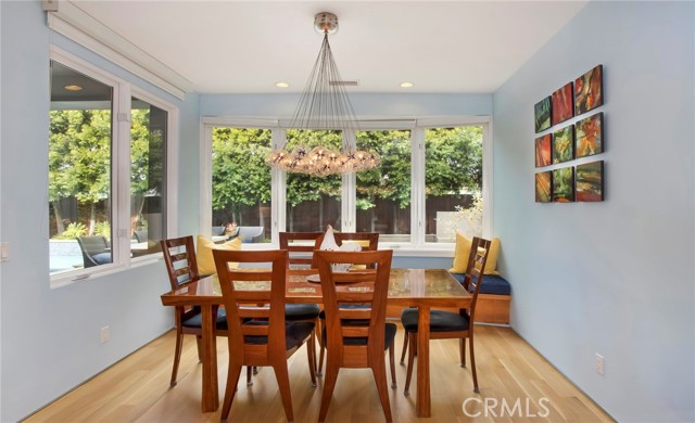 Comfortable dining nook for breakfasts and casual dining. Built in window seat with storage too.